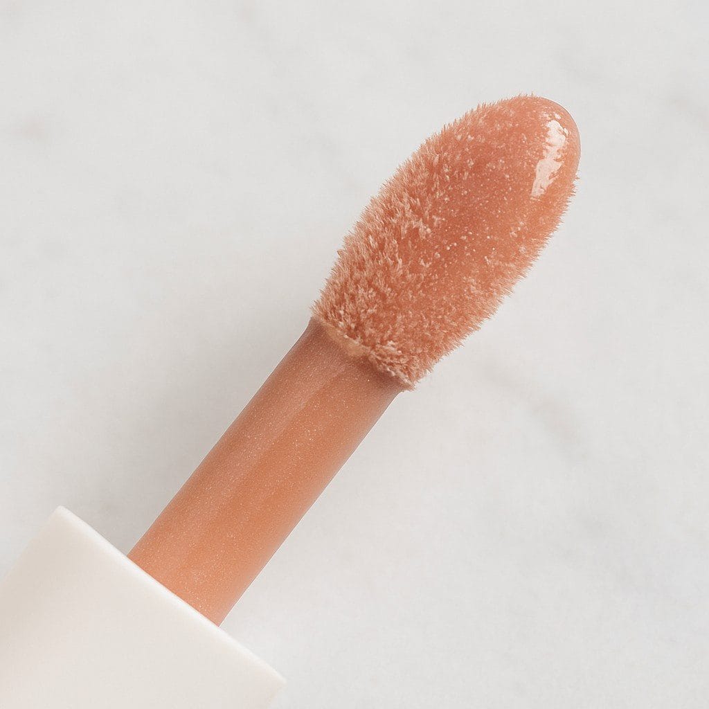 Close-up of Summer Fridays Lip Gloss texture and applicator tip