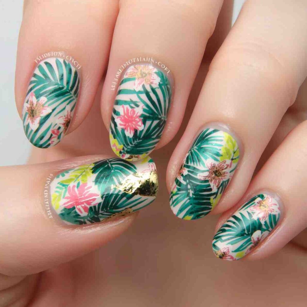 Floral tropical nail art with palm leaf and flower patterns
